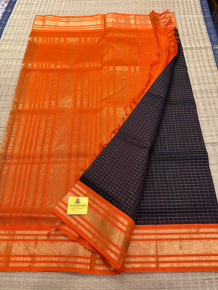Dark Coffee Brown with Fanta Orange colour ,rich zari checks in the body ,traditional borders  and rich pallu Korvai Silk Cotton Saree