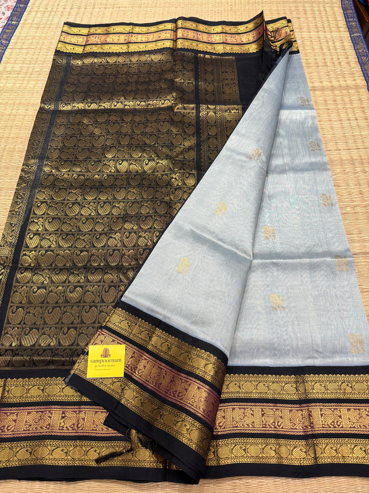 Grey with Black Rich Zari Butta in the body , Kanchi border and rich pallu Korvai Silk Cotton Saree