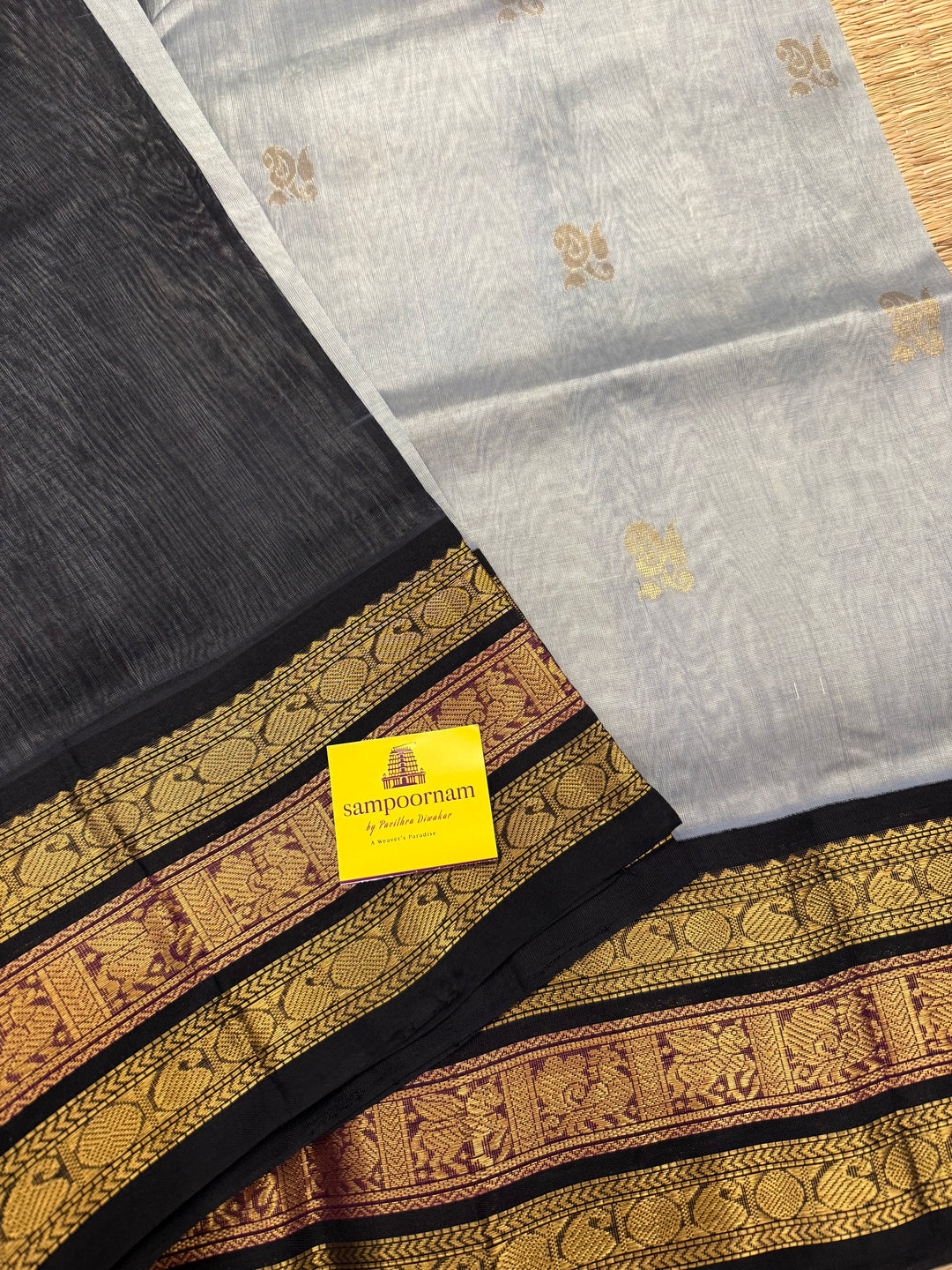 Grey with Black Rich Zari Butta in the body , Kanchi border and rich pallu Korvai Silk Cotton Saree