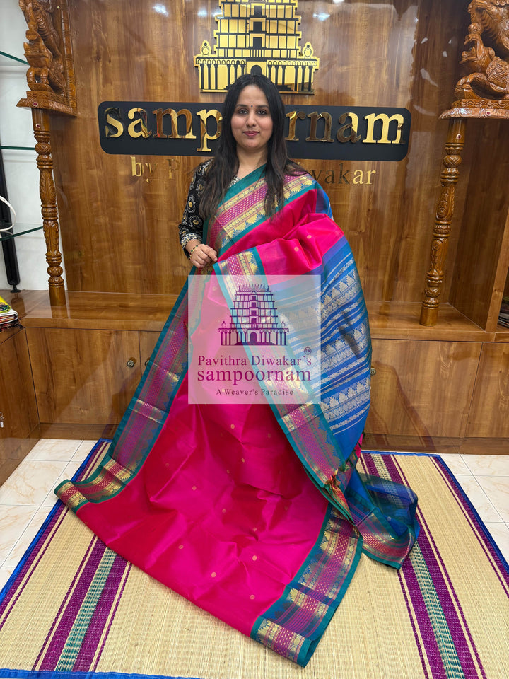 Magenta with Mayil Kazhuthu Blue, Zari Butta in the Body, Rettapet Lakshadeepam Butta Borders and Grand Pallu Korvai Silk Cotton Saree