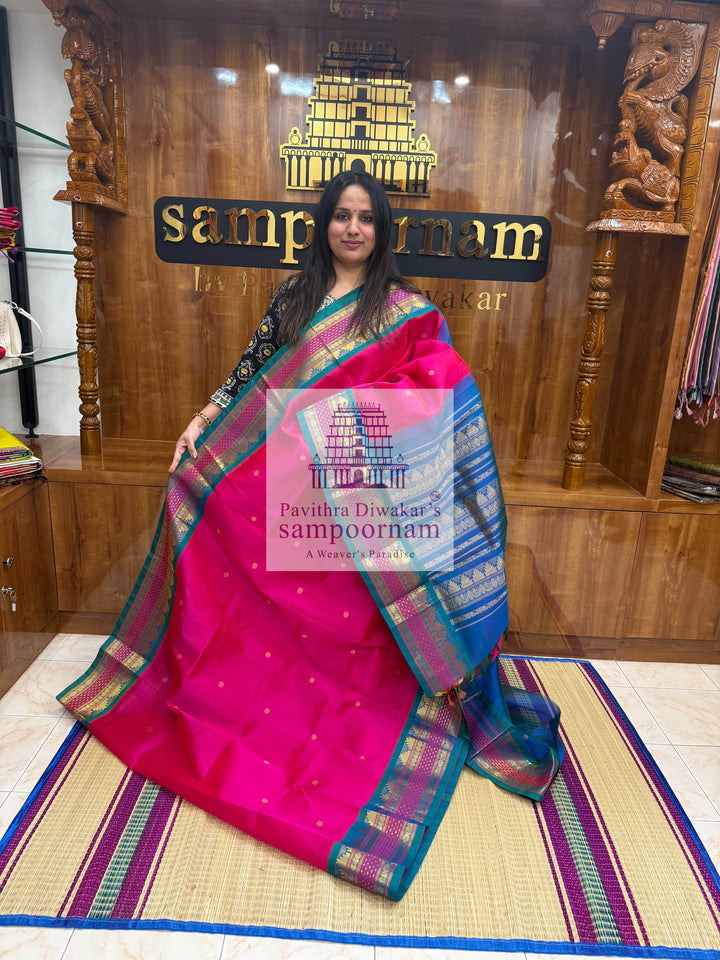 Magenta with Mayil Kazhuthu Blue, Zari Butta in the Body, Rettapet Lakshadeepam Butta Borders and Grand Pallu Korvai Silk Cotton Saree