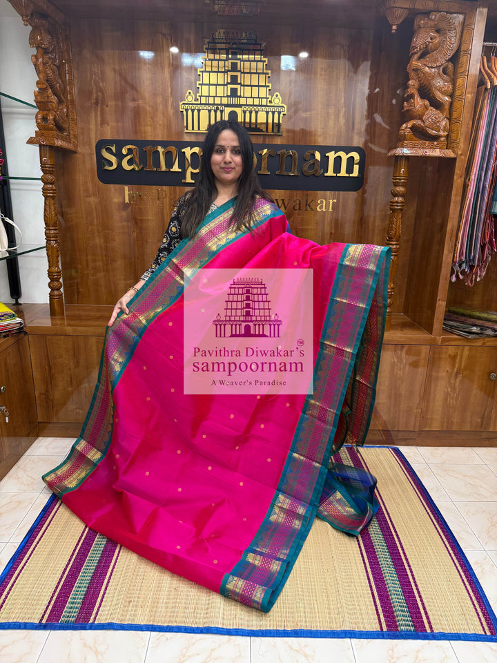 Magenta with Mayil Kazhuthu Blue, Zari Butta in the Body, Rettapet Lakshadeepam Butta Borders and Grand Pallu Korvai Silk Cotton Saree