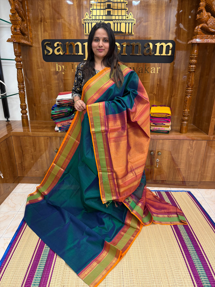 Mayilkazhuthu green with Dark rust Orange, rettapet Border and Grand Pallu , Korvai Silk Cotton Saree