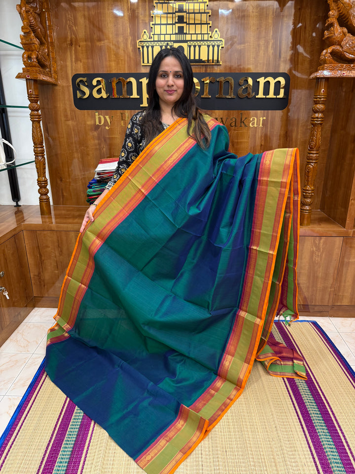 Mayilkazhuthu green with Dark rust Orange, rettapet Border and Grand Pallu , Korvai Silk Cotton Saree