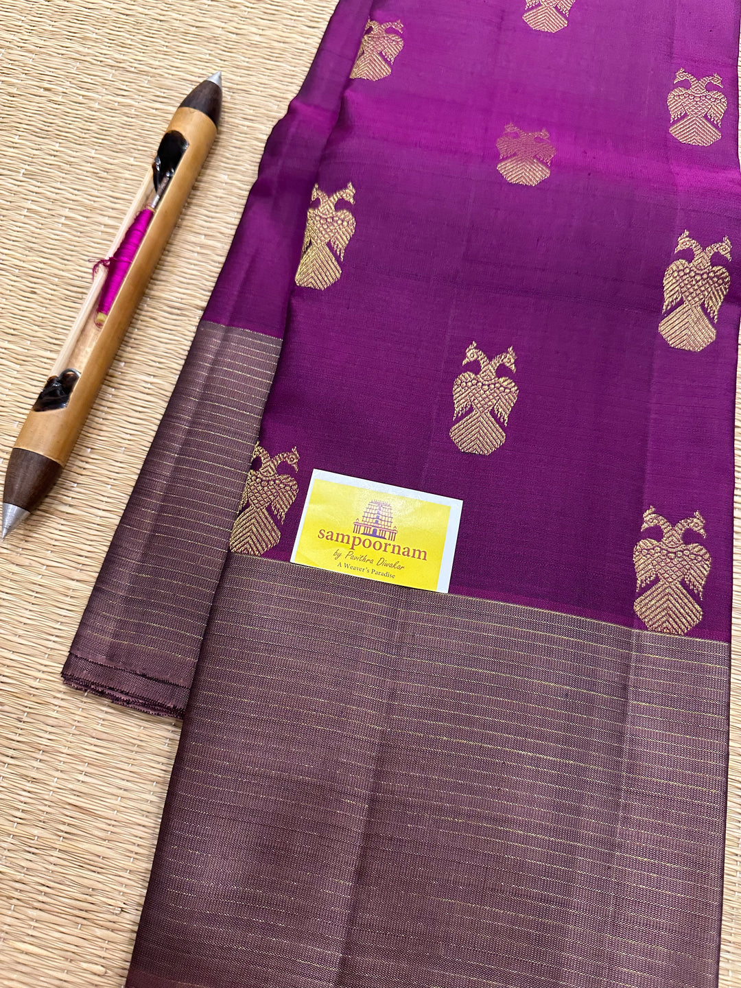 A Stunning Wine with Mauve Colour , Gandaberundu Zari Body Motif Rich Pallu- Kanjivaram Pure Silk Saree