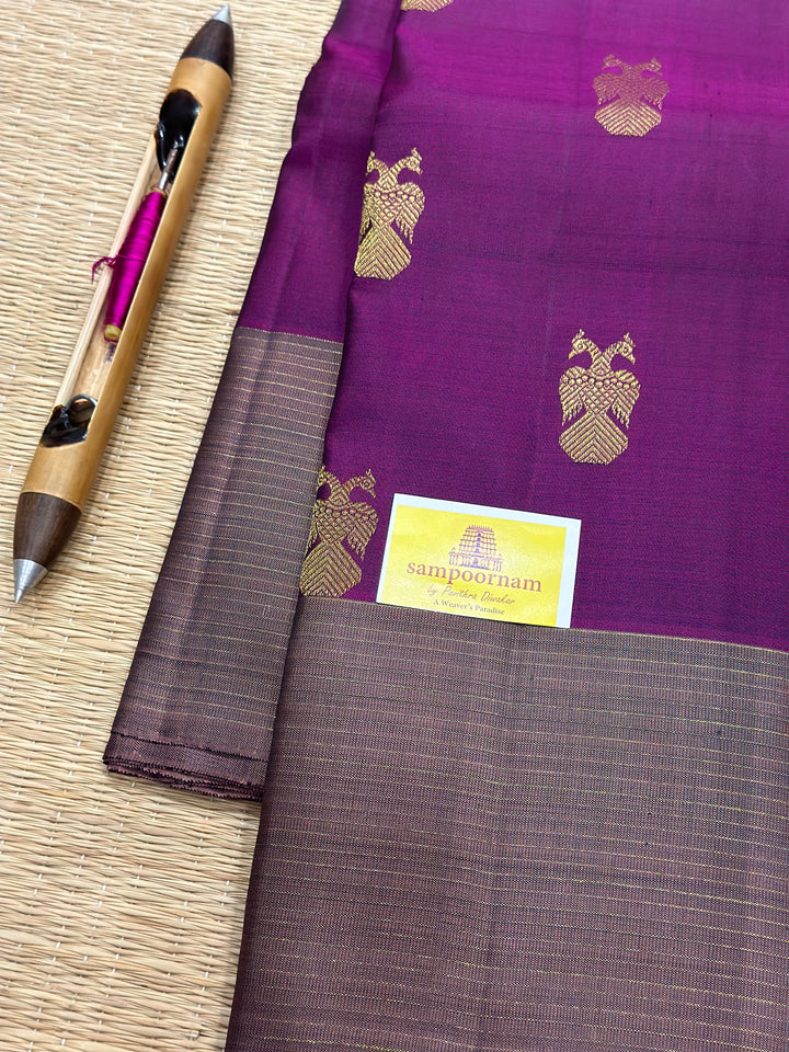 A Stunning Wine with Mauve Colour , Gandaberundu Zari Body Motif Rich Pallu- Kanjivaram Pure Silk Saree