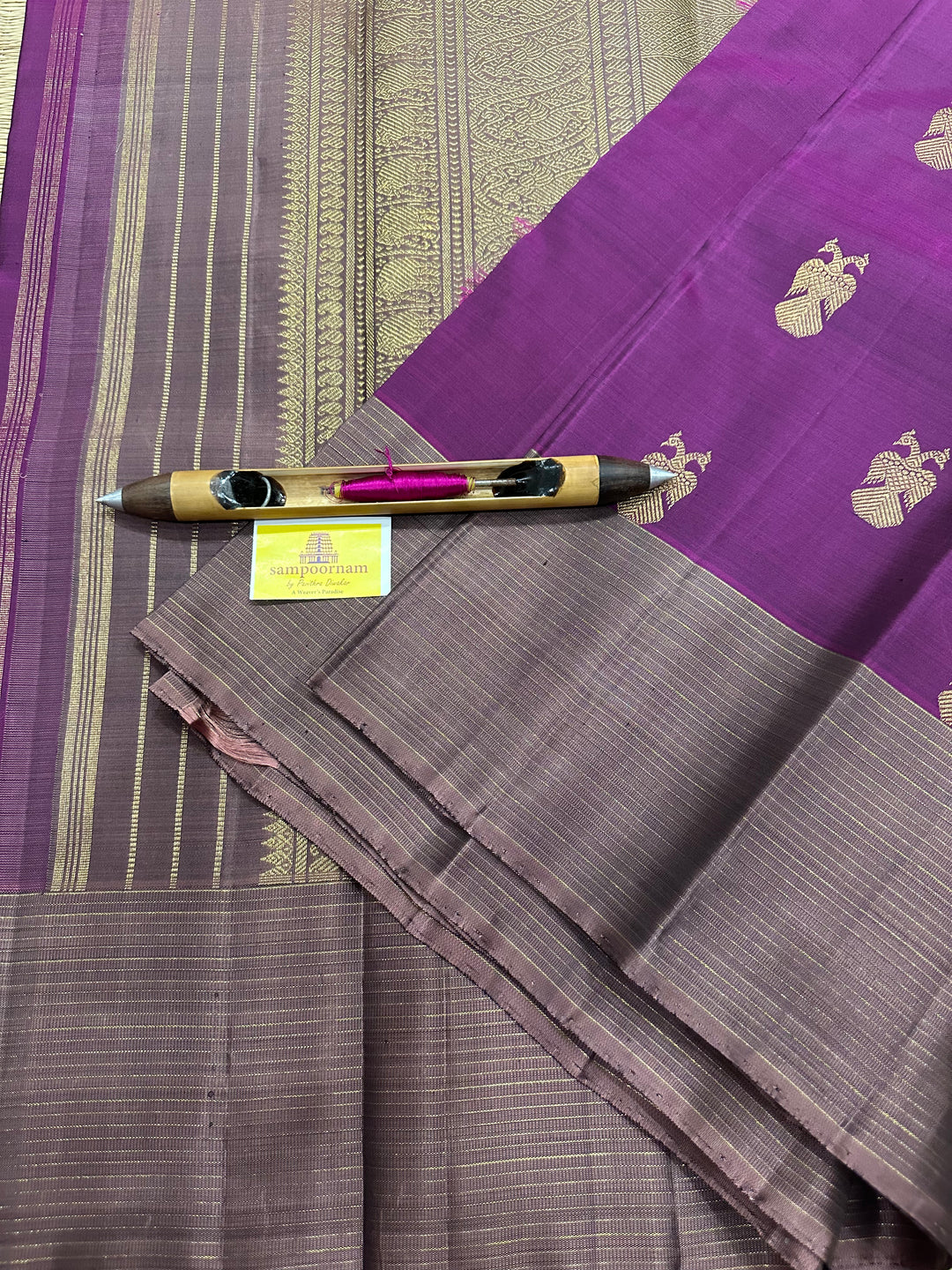 A Stunning Wine with Mauve Colour , Gandaberundu Zari Body Motif Rich Pallu- Kanjivaram Pure Silk Saree