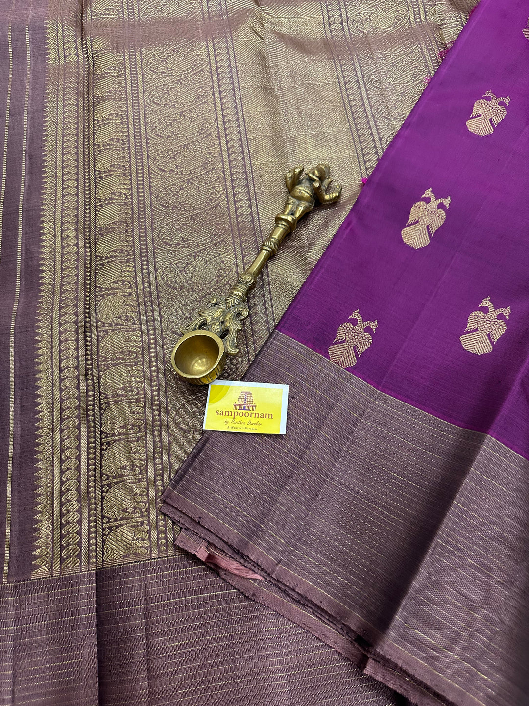 A Stunning Wine with Mauve Colour , Gandaberundu Zari Body Motif Rich Pallu- Kanjivaram Pure Silk Saree