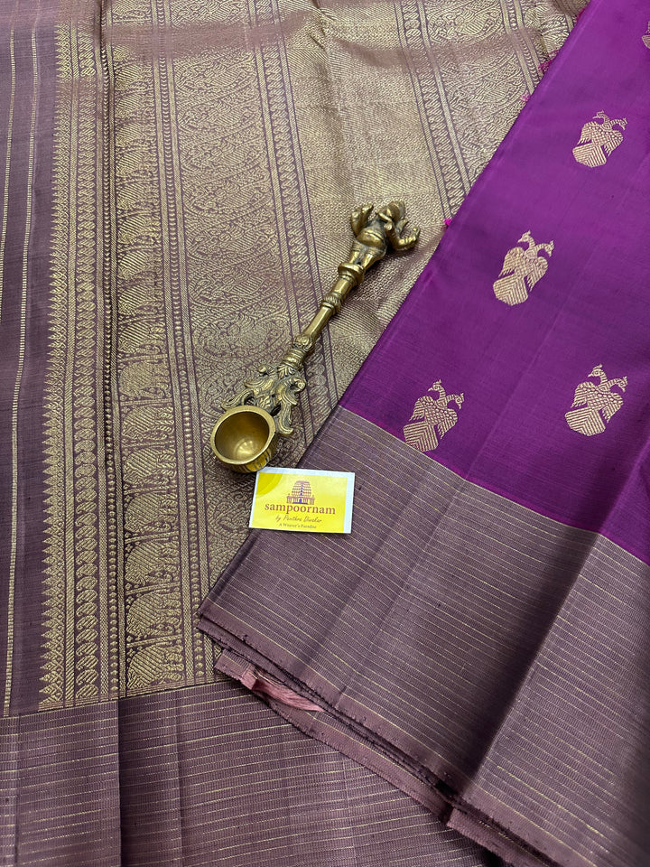 A Stunning Wine with Mauve Colour , Gandaberundu Zari Body Motif Rich Pallu- Kanjivaram Pure Silk Saree