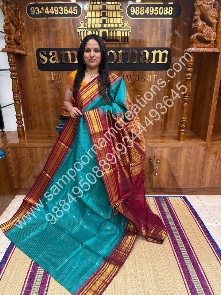 Rama Blue with Maroon ,  Rich Zari Checks with Mango Butta  in the body and Traditional Border , Grand Pallu Pure Korvai Silk Cotton Saree