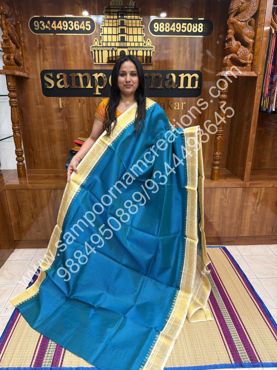 Ocean Blue with Offwhite ,  Rich Zari Checks in the body and Traditional  Border , Grand Pallu Pure Korvai Silk Cotton Saree
