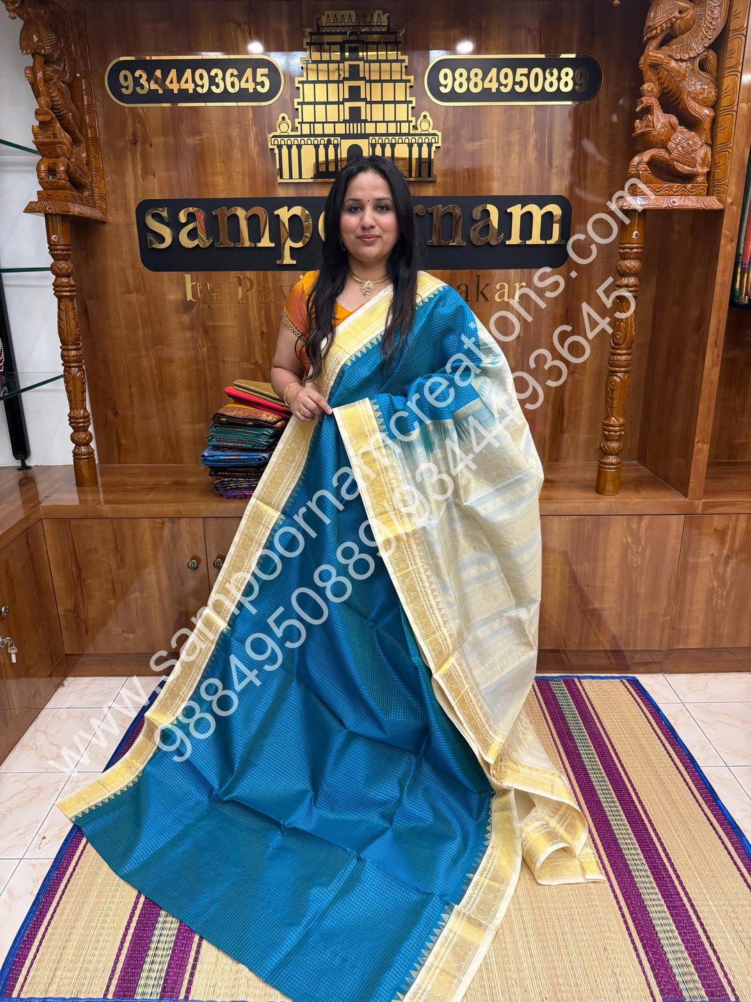 Ocean Blue with Offwhite ,  Rich Zari Checks in the body and Traditional  Border , Grand Pallu Pure Korvai Silk Cotton Saree