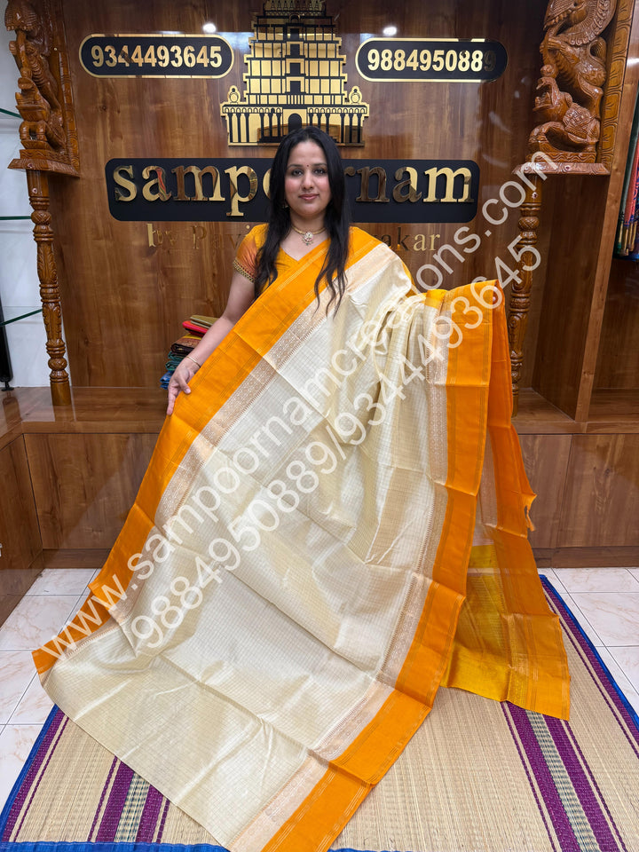 Offwhite with  yellow , Rich Zari Checks in the body and Rettapet Border , Grand Pallu Pure Korvai Silk Cotton Saree