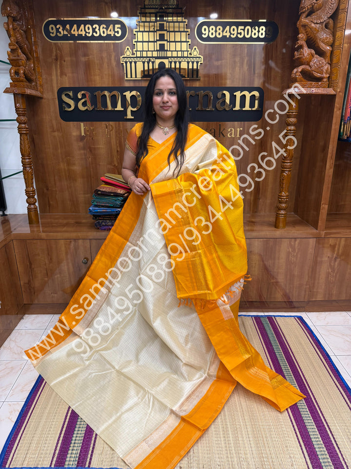 Offwhite with  yellow , Rich Zari Checks in the body and Rettapet Border , Grand Pallu Pure Korvai Silk Cotton Saree