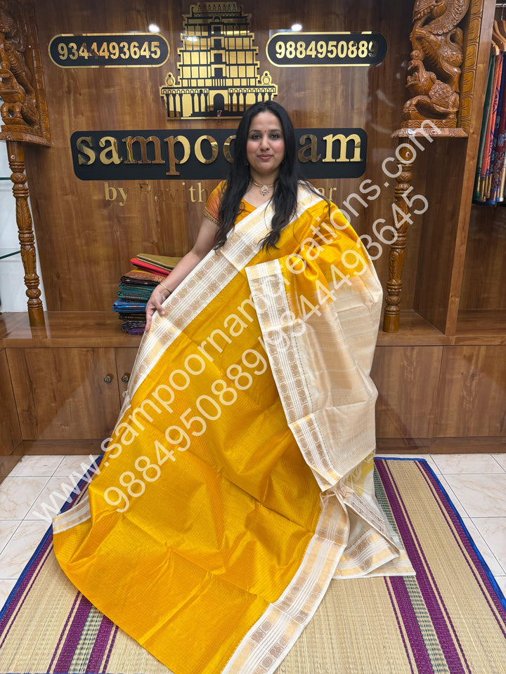 Yellow with Offwhite , Rich Zari Checks in the body and Rettapet Border , Grand Pallu Pure Korvai Silk Cotton Saree