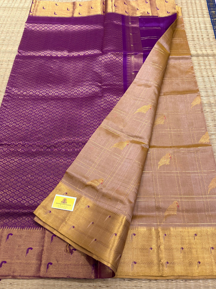 Light Biscuit Colour with Purple , parrot motifs and Zari checks in the body , Rich Pallu and paithani borders pure silk cotton saree