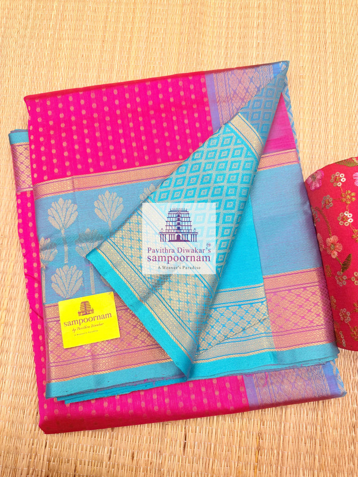 Rani Pink with Turquoise Blue , Zari butta in the body , one side big Satin border with Floral motif , traditional border and  Grand Pallu Korvai Silk Cotton Saree
