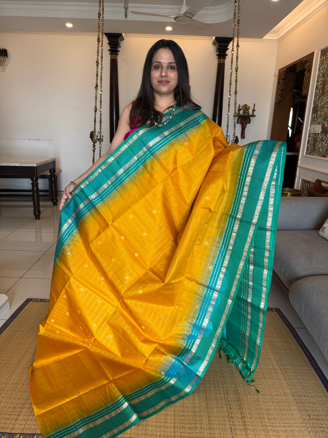 Yellow With Turquoise Blue ,zari butta with zari checks all over the body rettapet traditional borders and rich pallu Pure Soft Silk Sarees