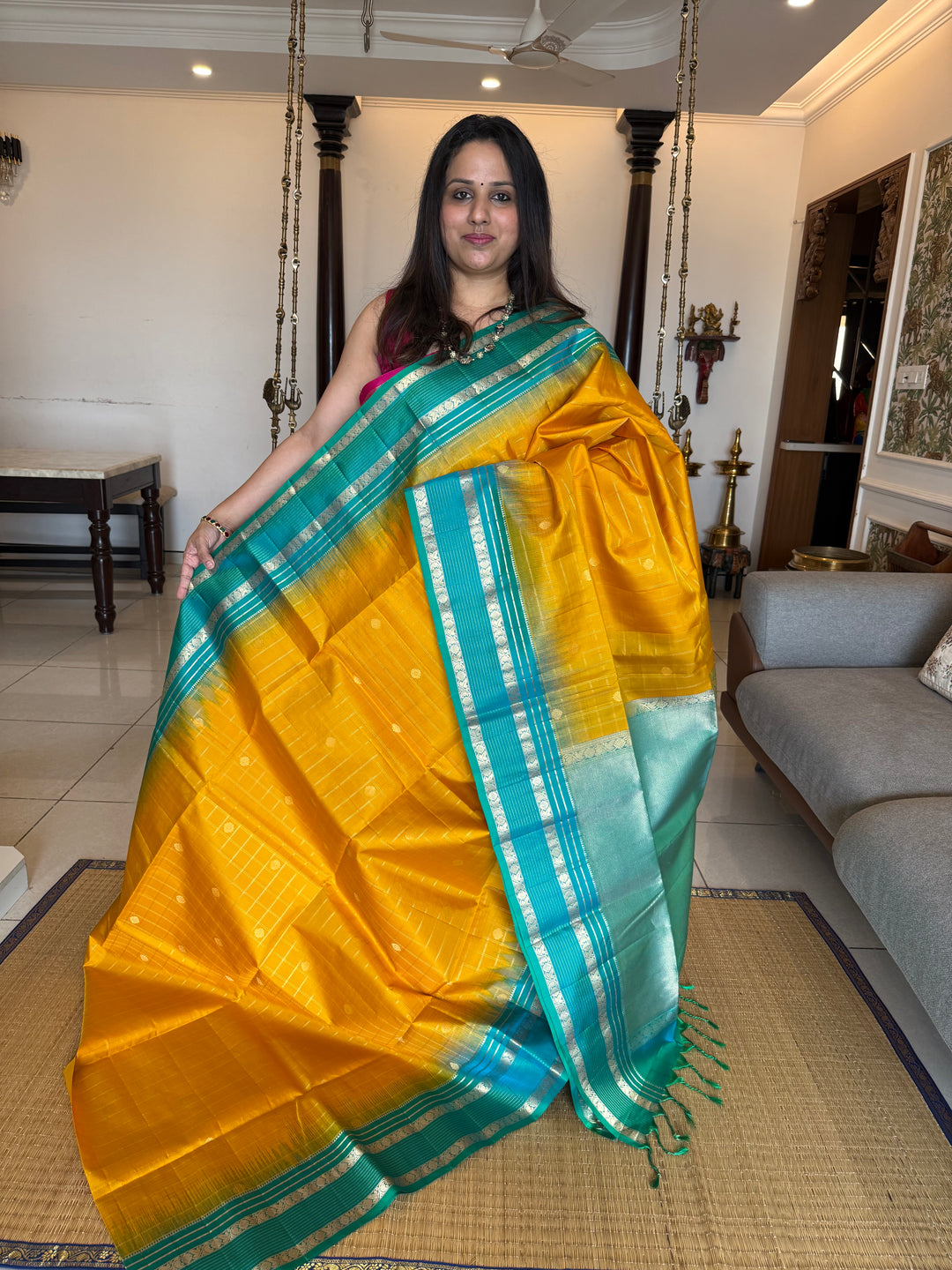 Yellow With Turquoise Blue ,zari butta with zari checks all over the body rettapet traditional borders and rich pallu Pure Soft Silk Sarees