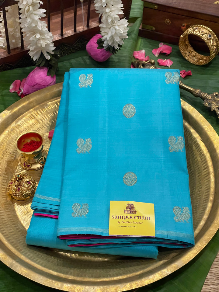 Copper Sulphate Blue with Pink Mayil Chakram Zari Body Butta , rich Pallu - Borderless Kanjivaram Pure Silk Saree