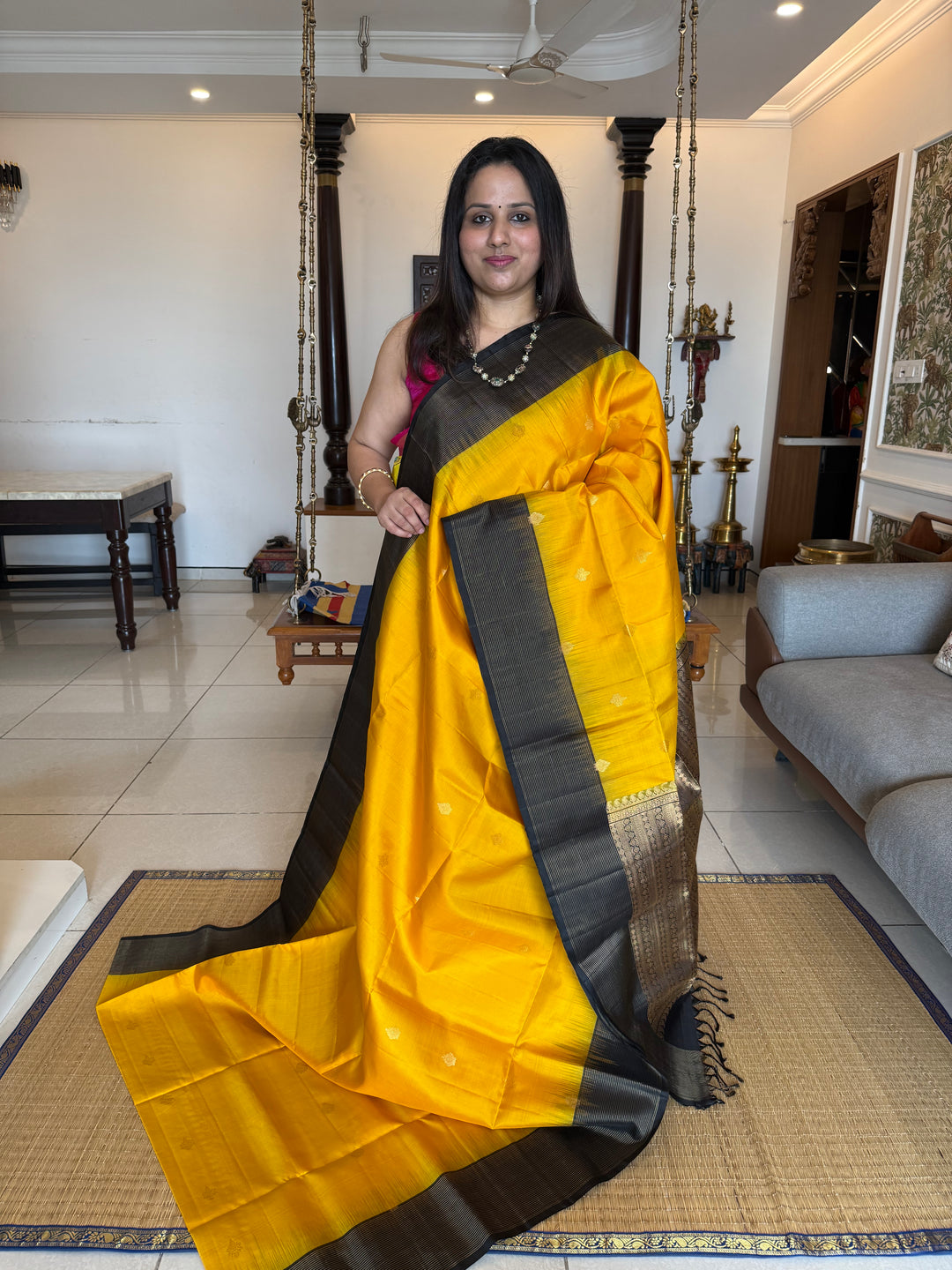 Manjal With Black vairasoosi lines in the border, rich  zari butta in the body and grand traditional Pallu Pure Soft Silk Saree