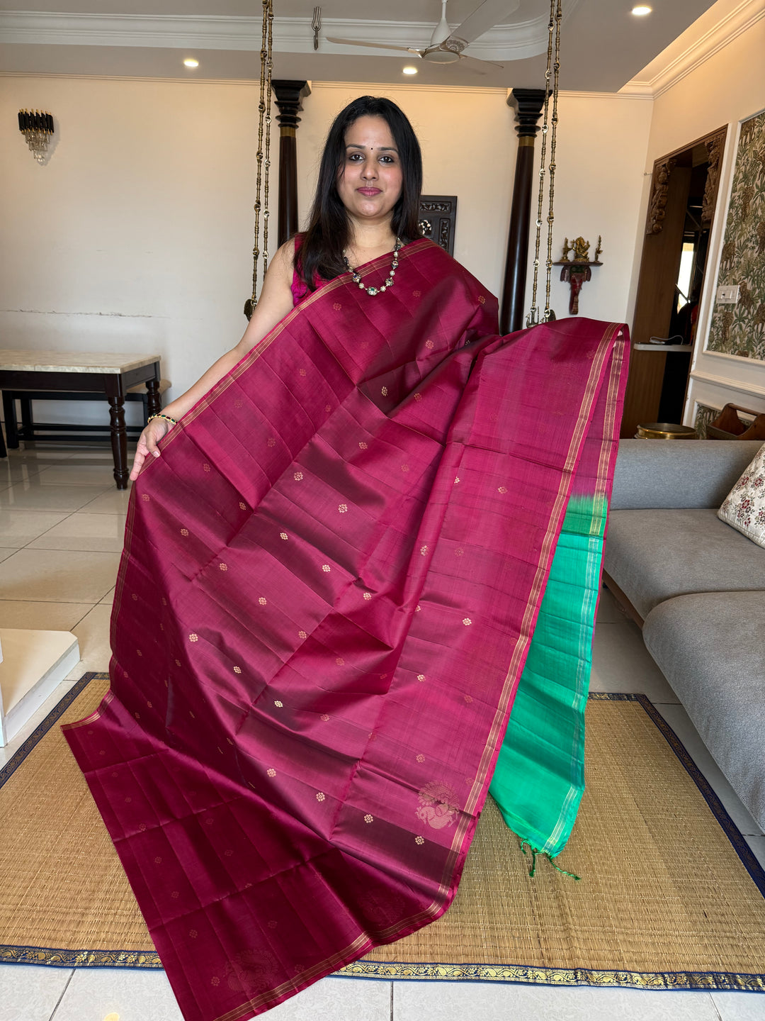 Deep Maroon With Turquoise Blue , rich annam butta in the lower border and small zari buttas in the body, rich Pallu Pure Soft Silk Saree