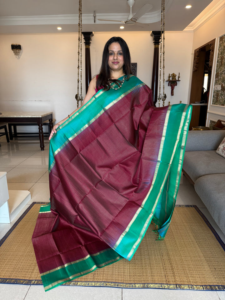 Dark Jamun  With Turquoise Blue ,rich zari podi kattam in the body,traditional rettapet borders and rich Pallu Pure Soft Silk Saree