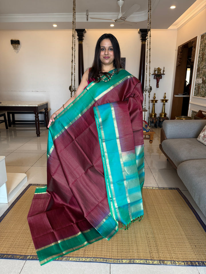 Dark Jamun  With Turquoise Blue ,rich zari podi kattam in the body,traditional rettapet borders and rich Pallu Pure Soft Silk Saree