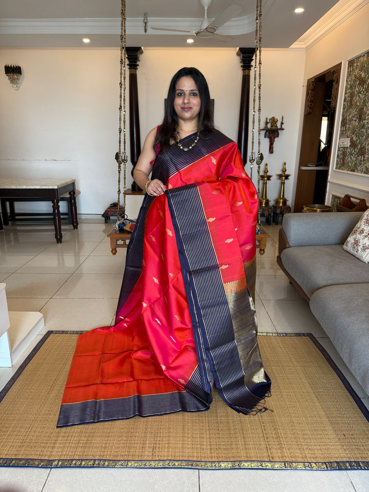 Deep Red With Dark Blue,vairaoosi lines in the borders, rich mango zari butta in the body and grand Pallu Pure Soft Silk Saree