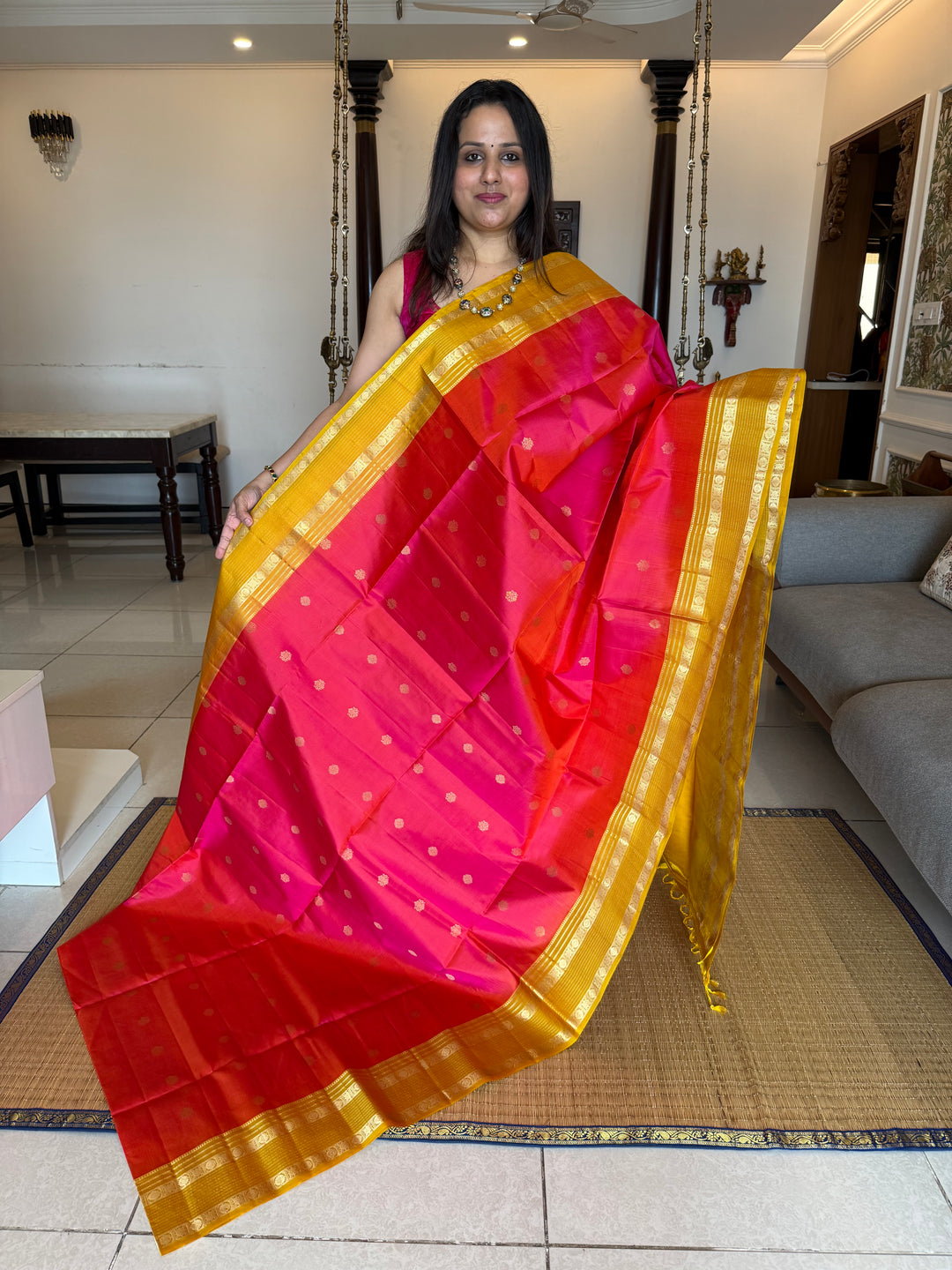 Reddish Pink With Yellow, traditional rettapet border, rich zari butta in the body and grand pallu Pure Soft Silk Sarees