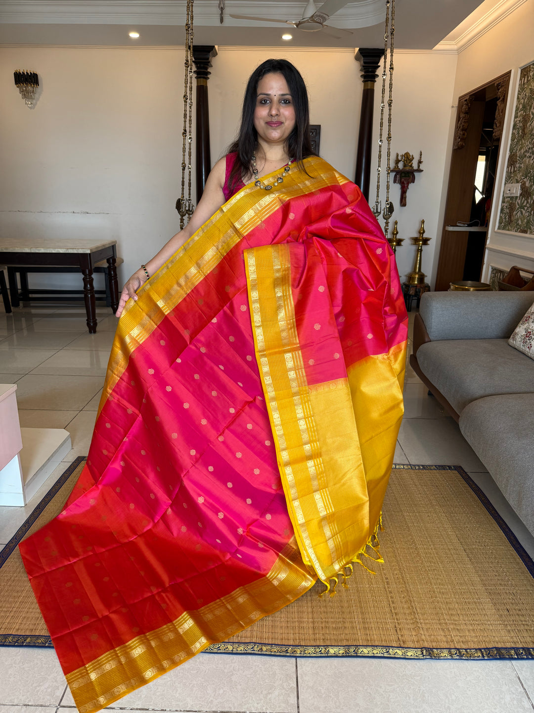 Reddish Pink With Yellow, traditional rettapet border, rich zari butta in the body and grand pallu Pure Soft Silk Sarees