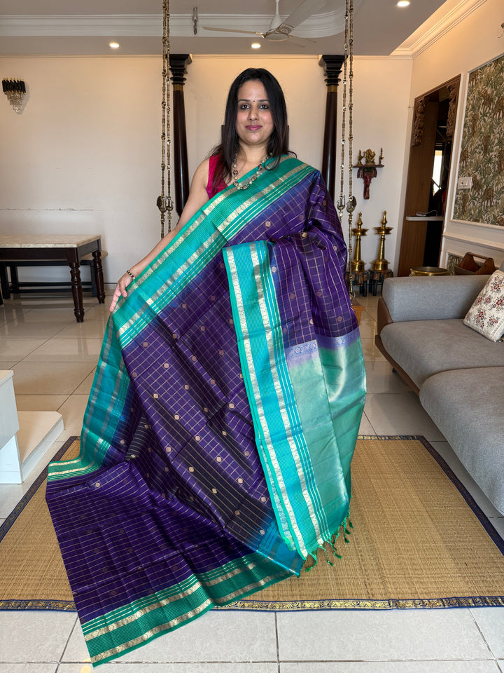 Dark Blue with Light Blue, rich zari butta with zari checks all over the body, Rettapet traditional borders and rich Pallu Pure Soft Silk Saree
