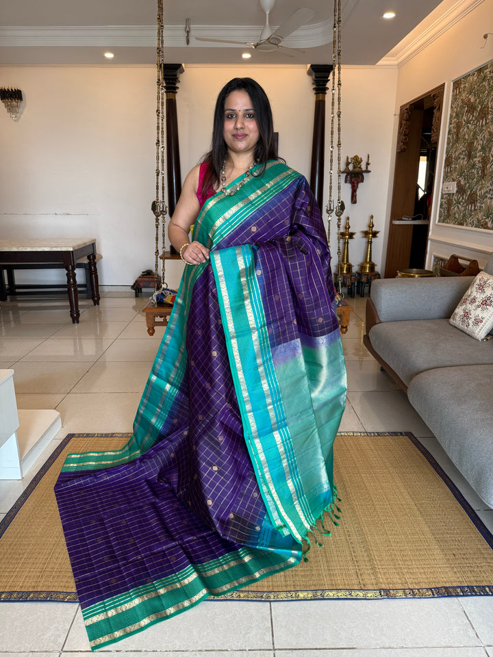 Dark Blue with Light Blue, rich zari butta with zari checks all over the body, Rettapet traditional borders and rich Pallu Pure Soft Silk Saree