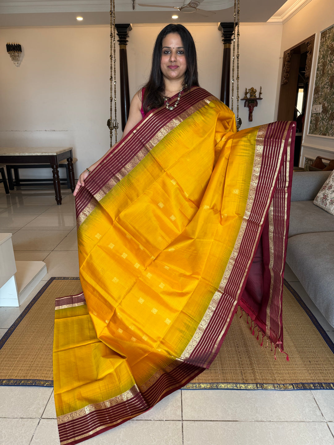 Manjal With Maroon,  traditional rettapet border, rich zari butta in the body and grand pallu Pure Soft Silk Saree