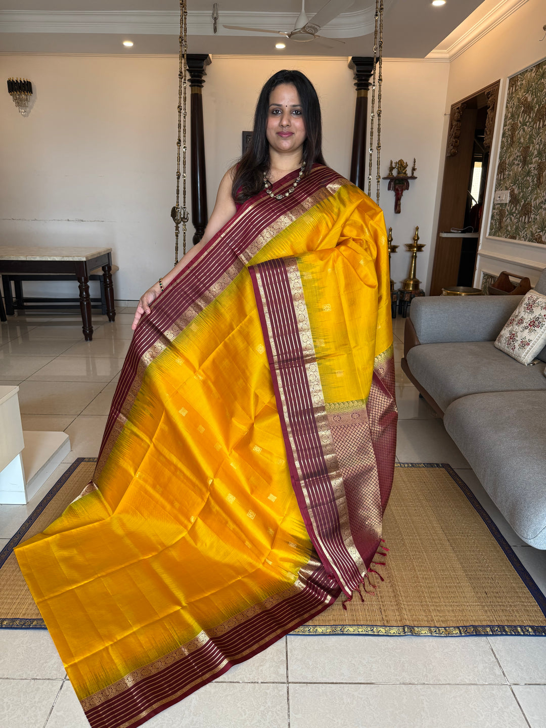 Manjal With Maroon,  traditional rettapet border, rich zari butta in the body and grand pallu Pure Soft Silk Saree