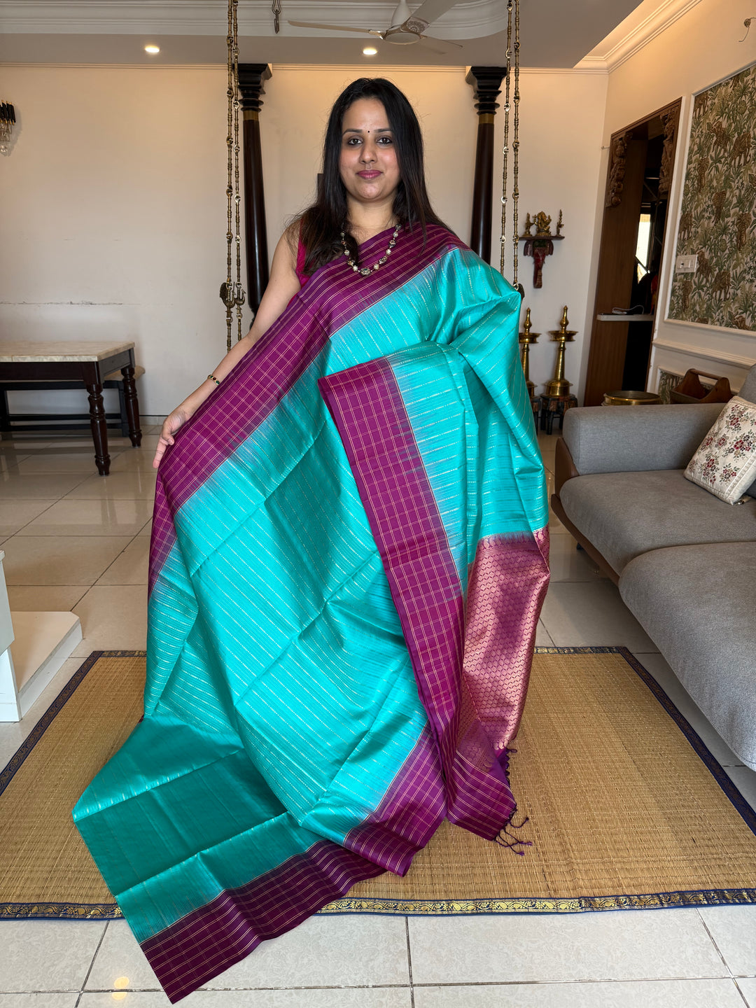 Rama Blue With Purple  colour , rich zari vertical line all over the body , traditional checks border and grand Pallu Pure Soft Silk Saree
