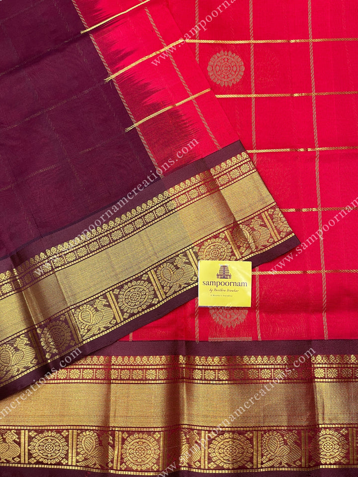 Red with Brown  , rich Zari checks in the body , Mayil and Chakram rich butta in the body , traditional border and  rich Pallu Silk Cotton Saree