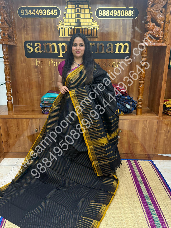 Elegant Black with Mustard Selvedge , Rich Vertical and Horizantal  Zari Lines in the body , Mango Zari border with rich Pallu Chettinaad Cotton Saree