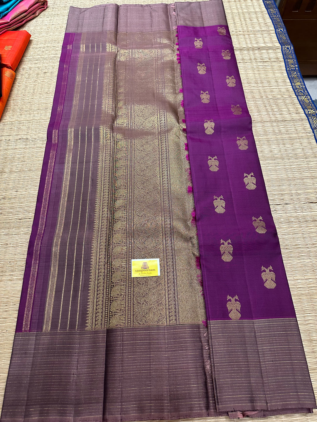 A Stunning Wine with Mauve Colour , Gandaberundu Zari Body Motif Rich Pallu- Kanjivaram Pure Silk Saree