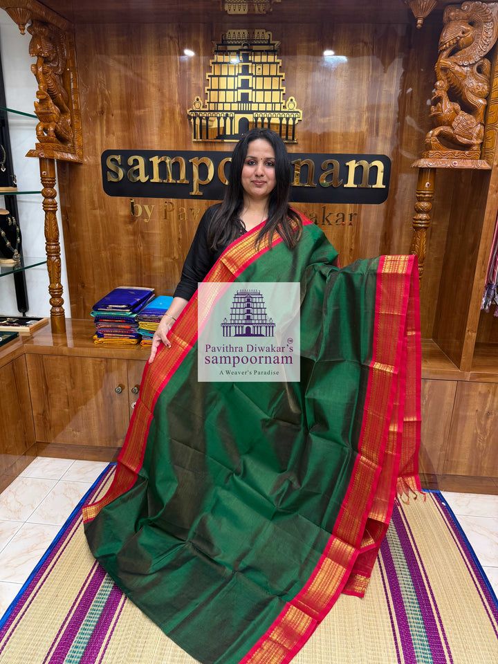 Forest Green with Red , Vairaoosi Zari lines in the body and traditional border  , Rich Pallu Korvai Silk Cotton Saree
