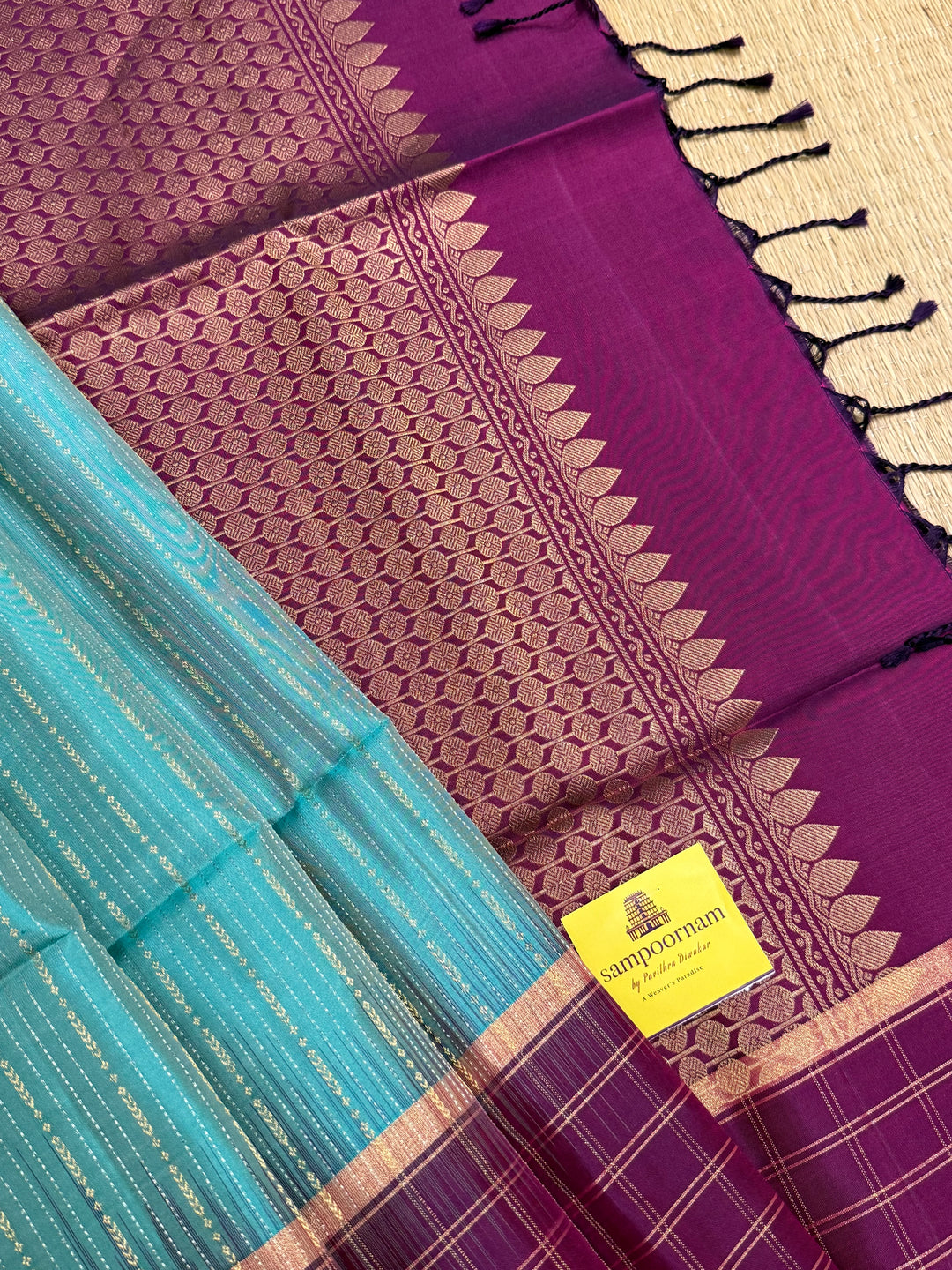 Light Rama Blue with Purple , rich zari vertical line all over the body , traditional checks border and grand Pallu Pure Soft Silk Saree