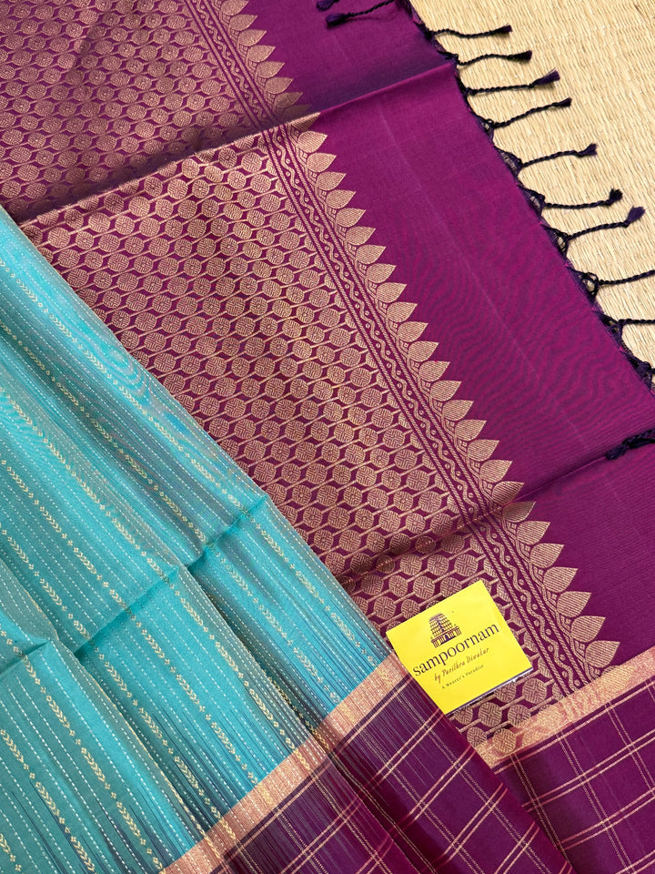 Light Rama Blue with Purple , rich zari vertical line all over the body , traditional checks border and grand Pallu Pure Soft Silk Saree