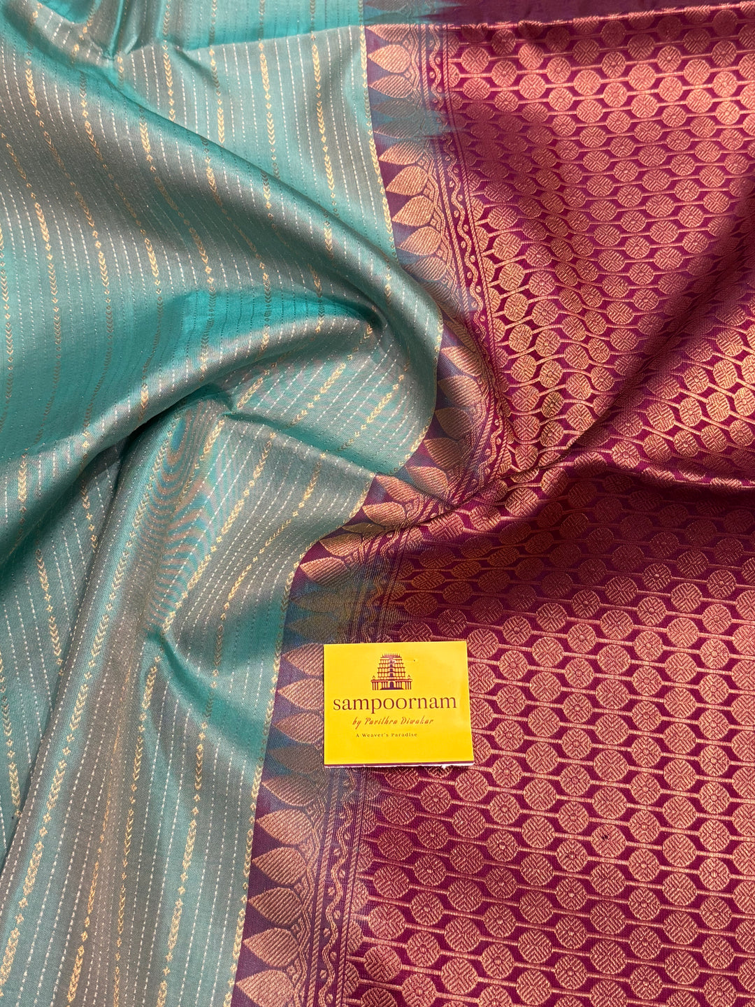 Light Rama Blue with Purple , rich zari vertical line all over the body , traditional checks border and grand Pallu Pure Soft Silk Saree