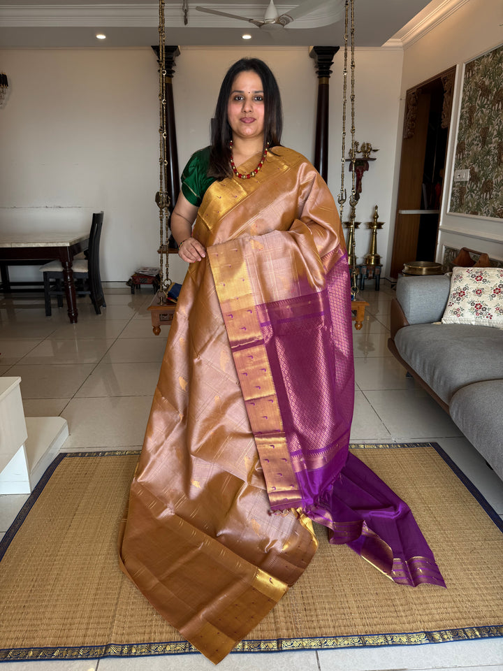 Light Biscuit Colour with Purple , parrot motifs and Zari checks in the body , Rich Pallu and paithani borders pure silk cotton saree