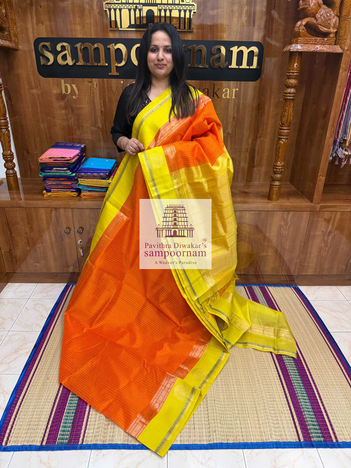 Orange with Lemon Yellow , thread checks in the body and Iruthalai Pakshi border , Rich Pallu Korvai Silk Cotton Saree