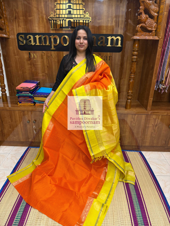 Orange with Lemon Yellow , thread checks in the body and Iruthalai Pakshi border , Rich Pallu Korvai Silk Cotton Saree