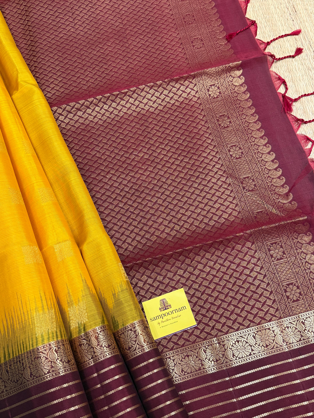 Manjal With Maroon,  traditional rettapet border, rich zari butta in the body and grand pallu Pure Soft Silk Saree