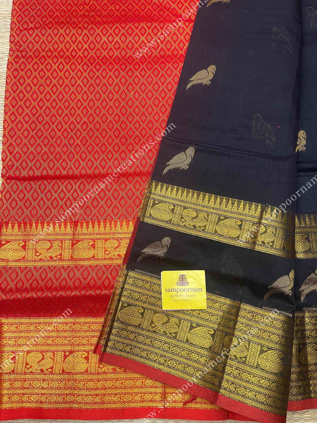 Black with Red , Zari Parrot motif in the body and  One side big rettapet border , grand Pallu Silk Cotton Saree