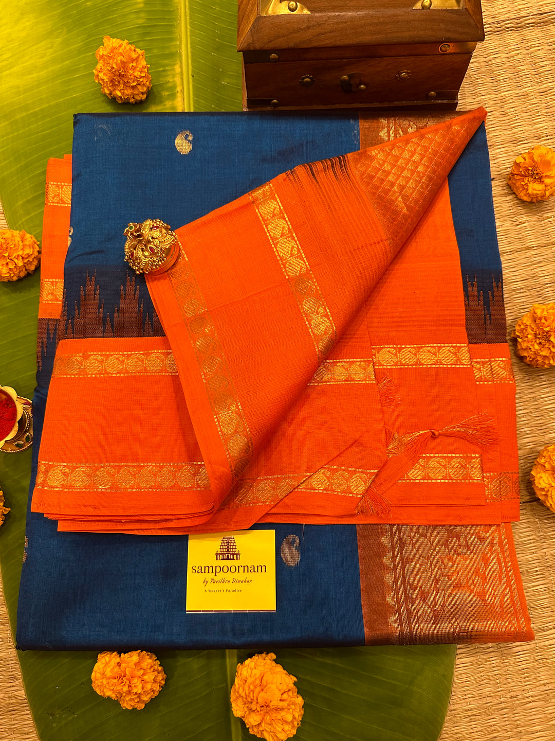 Blue with Orange Zari butta Temple Rettapet Border, Rich Pallu Korvai Silk Cotton Saree