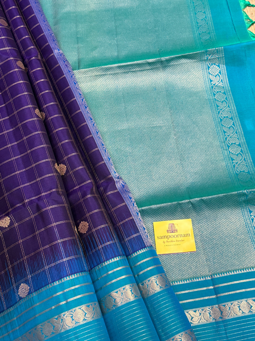 Dark Blue with Light Blue, rich zari butta with zari checks all over the body, Rettapet traditional borders and rich Pallu Pure Soft Silk Saree